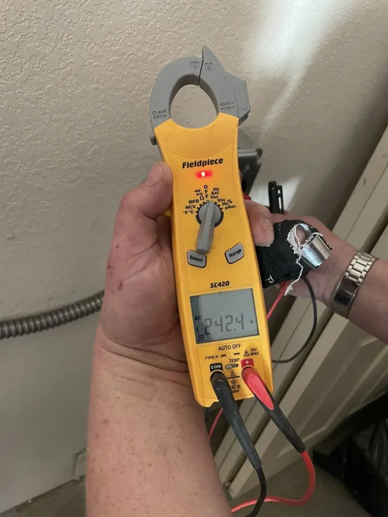 Voltage testing with clamp meter during Generator Installation in Eastman